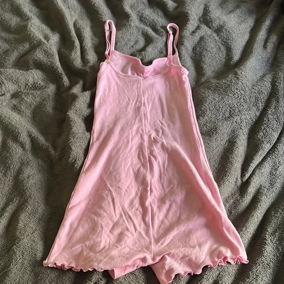 SKIMS LOGO POINTELLE ONESIE | BUBBLE
GUM - Picture 7 of 7